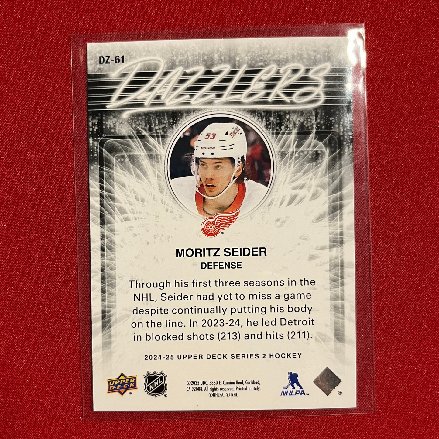 Moritz Seider #DZ-61 2024-25 Upper Deck Series 2 Dazzlers (Orange)